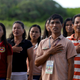 Filipinos living in Philippine occupied (Pagasa) Thitu island, in disputed South China Sea, sing the country's national anthem April 21, 2017.